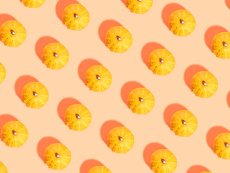 Ornamental halloween pumpkin pattern isolated on peach orange backgroundの写真素材