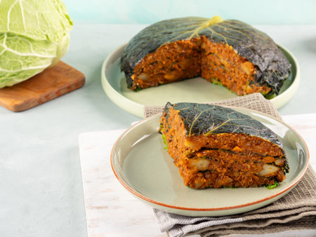 Chou farci, stuffed savoy cabbage pie with lentil quinoa raguの写真素材