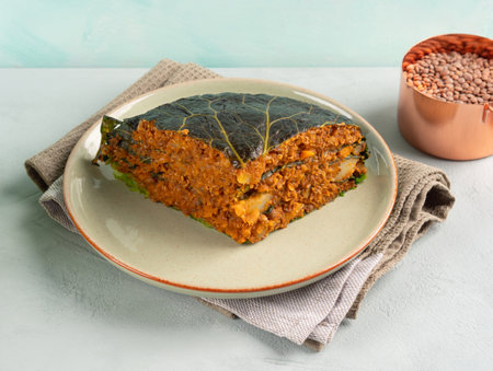 Chou farci, stuffed savoy cabbage pie with lentil quinoa raguの写真素材