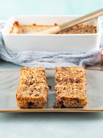 Baked oatmeal peanut butter banana cake bars with chocolate chipsの写真素材
