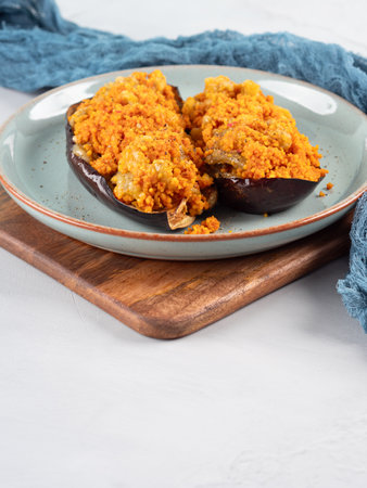 Baked eggplants stuffed with corn couscous with chickpea sauceの写真素材