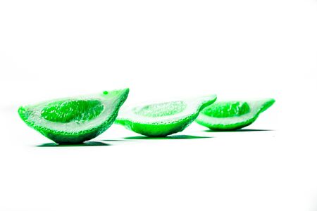 lemons positionned different way on a white backgroundの写真素材