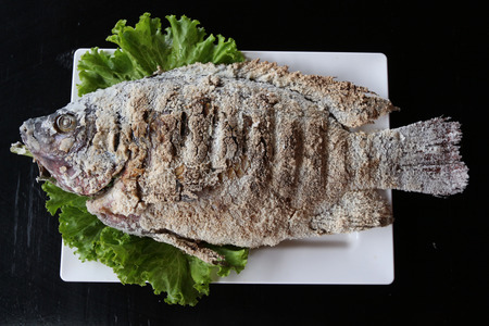 Grilled tilapia with salt.の写真素材