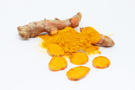 Turmeric root and turmeric powder isoleted on white background.の写真素材