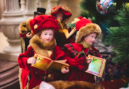 Classic traditional toy doll Christmas carol singersの写真素材