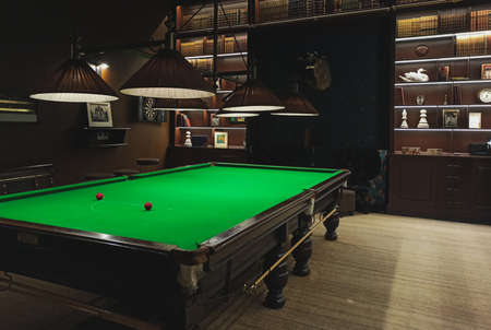 A full size snooker / billiards table in a classic style games room parlourの写真素材