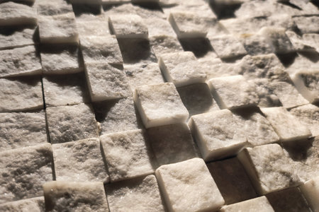 Geometric square cube block shapes forming an abstract wall backgroundの写真素材