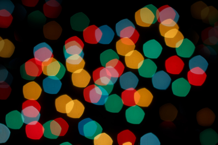 Christmas garland blurred. Abstract and colorful bokeh background. New year, party and holiday.の写真素材