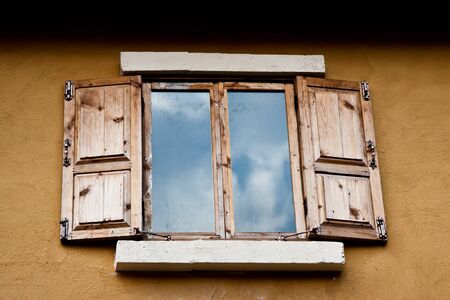 wooden window reflect gray cluond