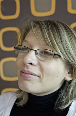  pretty girl with glasses smilingの写真素材