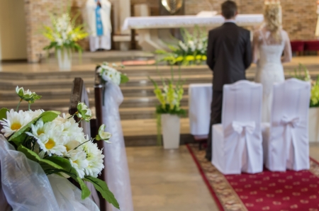 the wedding bouquete in church during ceremonyの写真素材