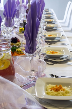 beautifully set table in restaurantの写真素材