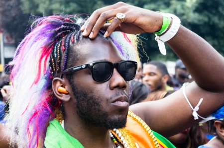 LONDON - AUGUST 25: Participants of Notting Hill Carnival August 25, 2013 in London, UK. Europe's biggest celebration of music, movement and masquerade.のeditorial素材