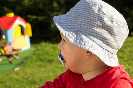 Small boy wearing hatの写真素材