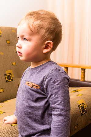 Portrait of standing little Caucasian boy  isolatedの写真素材