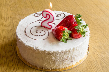 small cream cake on second birthdayの写真素材
