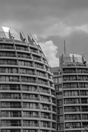 the modern skyscraper with lots of balconies