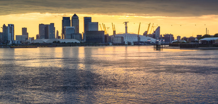 LONDON, UK - JULY 26 2014: Canary Wharf and o2 arena in  London UKのeditorial素材