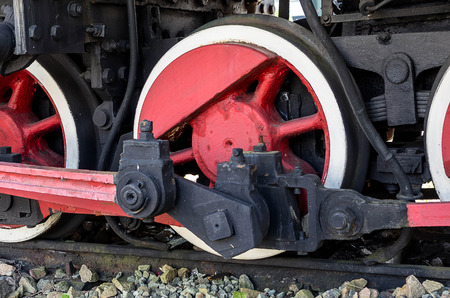 The drive wheels of an old steam locomotiveの写真素材