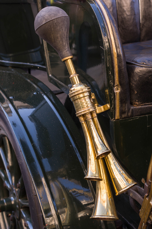 horn - chrome-plated trumpet, part of an old carの写真素材