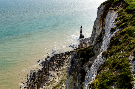 Lighthouse guarding the coastline in the area of Eastbourneの写真素材