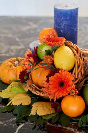 a small thanksgiving decoration, pumpkin, candle etcの写真素材