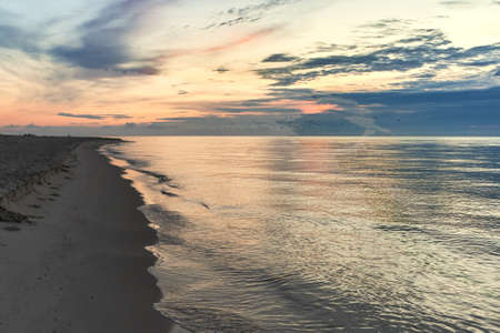 A sunrise on  Baltic sea, Poland, Hel beachの写真素材