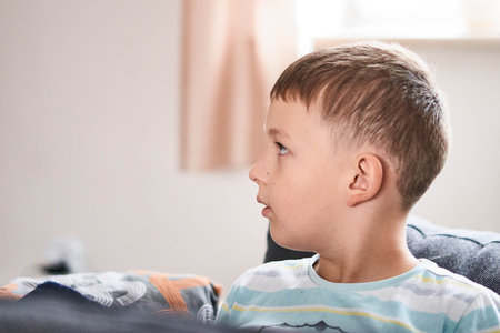 Portrait of white schoolboy, blured backgroundの写真素材