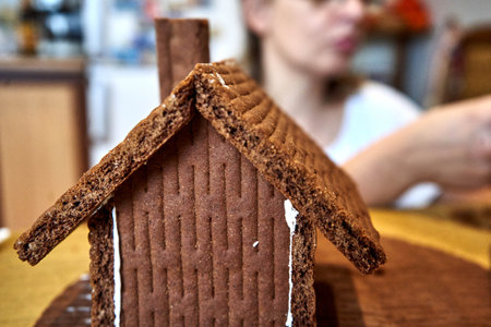 Making gingerbread house before christmas timeの写真素材