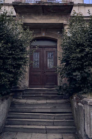 Old and scary house and frontyardの写真素材