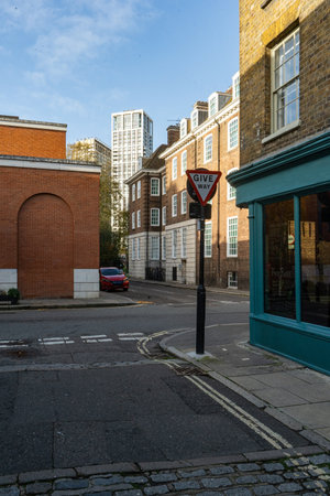 Small crossroad in London, old and moder buildingのeditorial素材