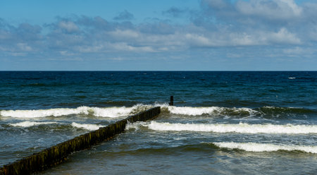 Huge waves and waterbreaker at Baltic sea.の写真素材
