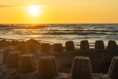 Sunset on Baltic sea beachの写真素材