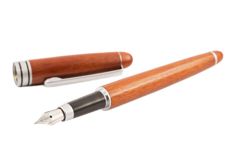Wooden fountain pen isolated on whiteの写真素材