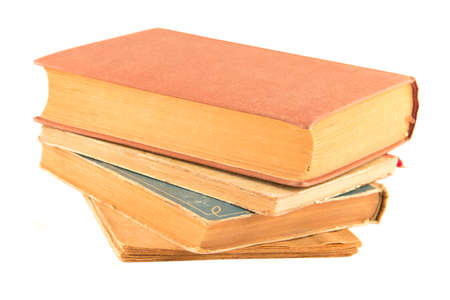 Four old books on a white backgroundの写真素材