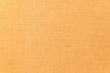 The ocher linen canvas textureの写真素材