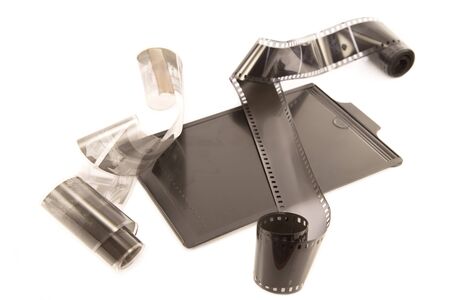 Antique photography panel and the film strips on whiteの写真素材