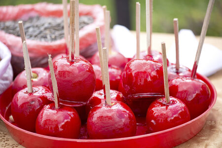 Apple candy on a standの写真素材