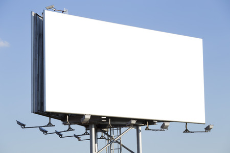 Blank billboard over a blue skyの写真素材
