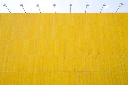 Huge wooden yellow billboardの写真素材