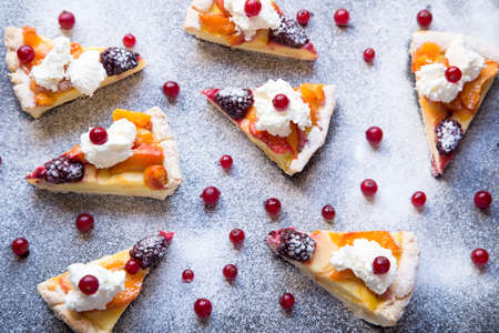 Fruit tart with powder sugar backgroundの写真素材