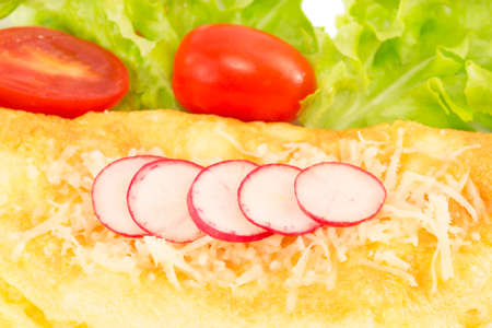 Omlette with salad close up