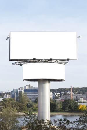 Blank billboards near the river in urban environmentの写真素材