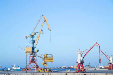 Industrial cranes in a harborの写真素材