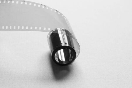 Film strip on a gray cardboard backgroundの写真素材