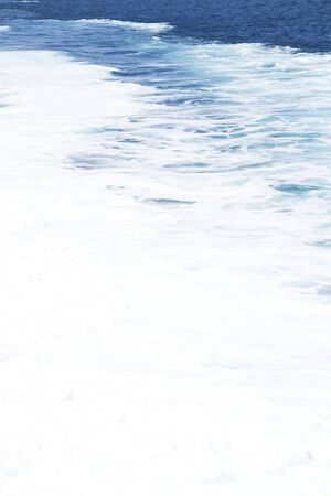 Foamy sea waterの写真素材