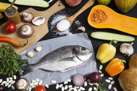 Food ingredients and aurata fishの写真素材