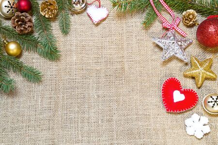 Christmas decoration on a burlap backgroundの写真素材