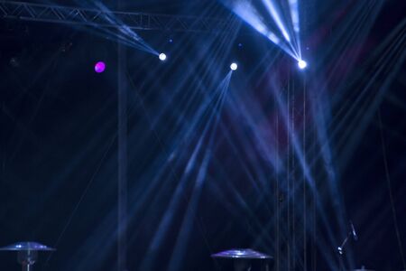 Blue stage lights with laser raysの写真素材