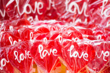 Red lollipops backgroundの写真素材